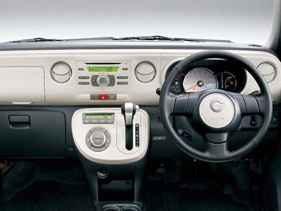  Daihatsu Mira Cocoa 2009 года  (фото 2 из 4)